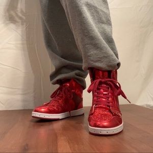 red sparkles high top shoes